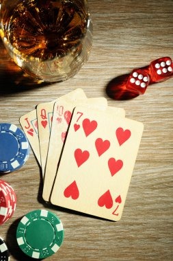 Live roulette dealer spinning the wheel in a multi-camera studio